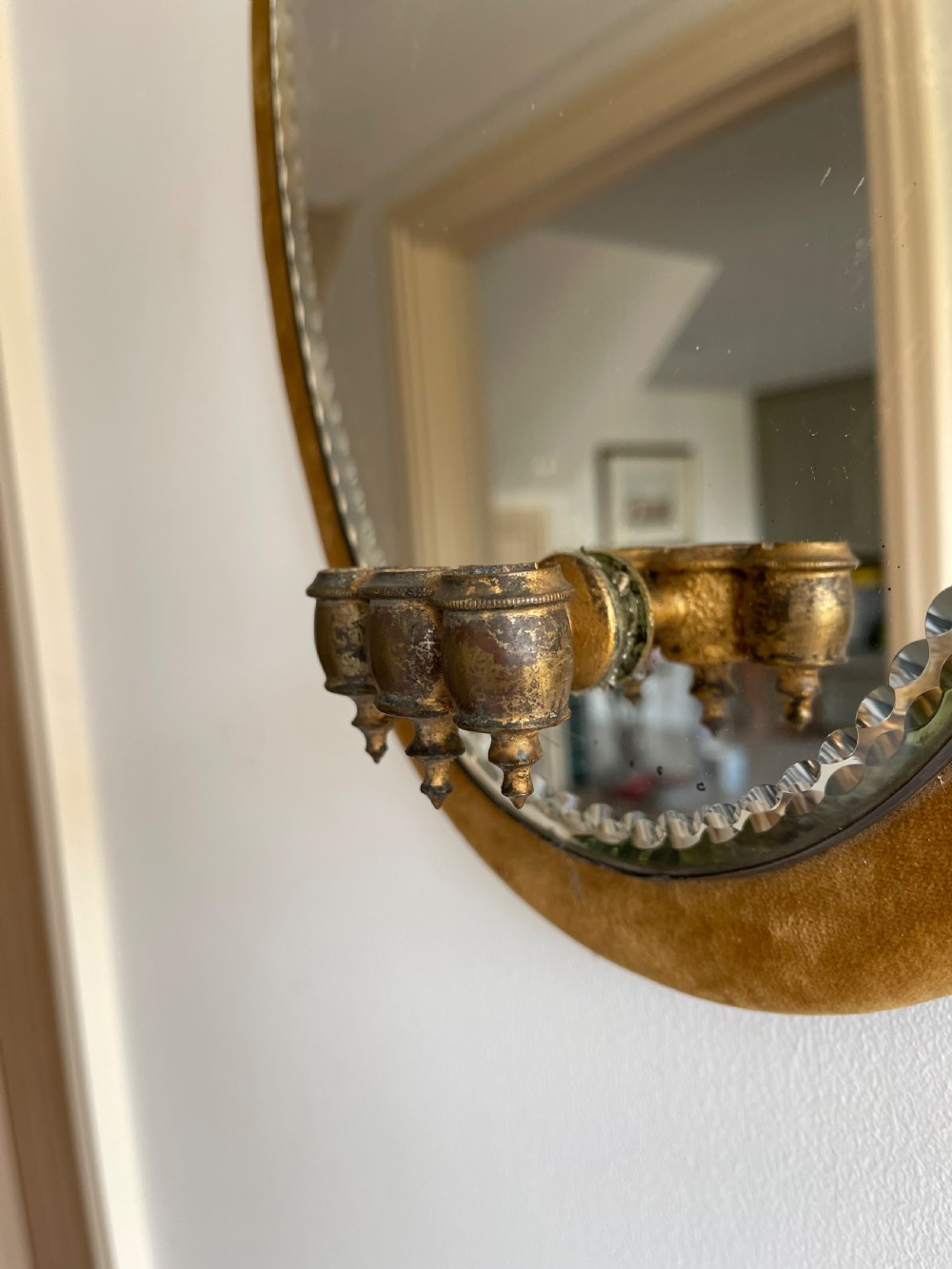 Velvet framed mirror with candle sconce.  View III