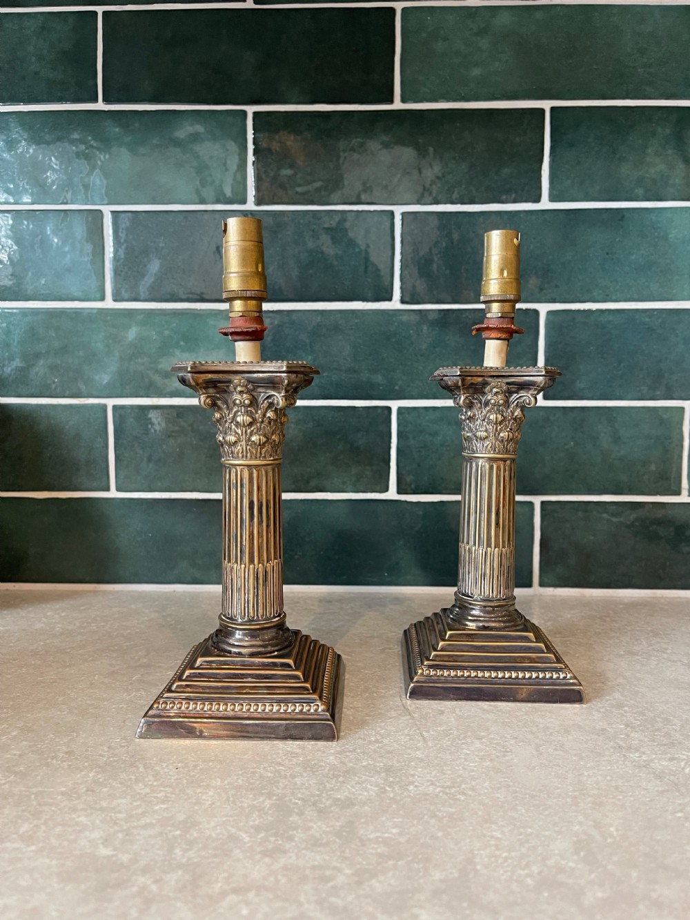 Pair of Corinthian column lamps 