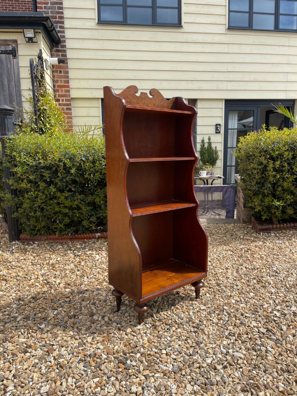 Small mahogany waterfall bookcase 