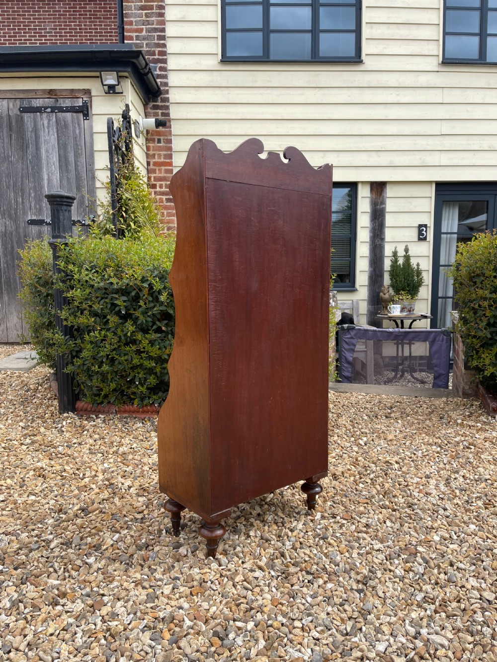 Small mahogany waterfall bookcase  View II