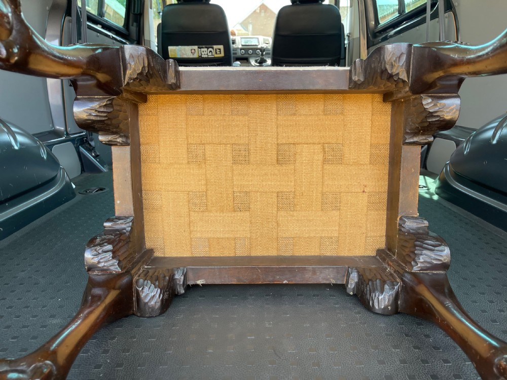 A Georgian style stool with dark carved mahogany cabriole legs ending in ball and claw feet and a padded rectangular seat. View IV