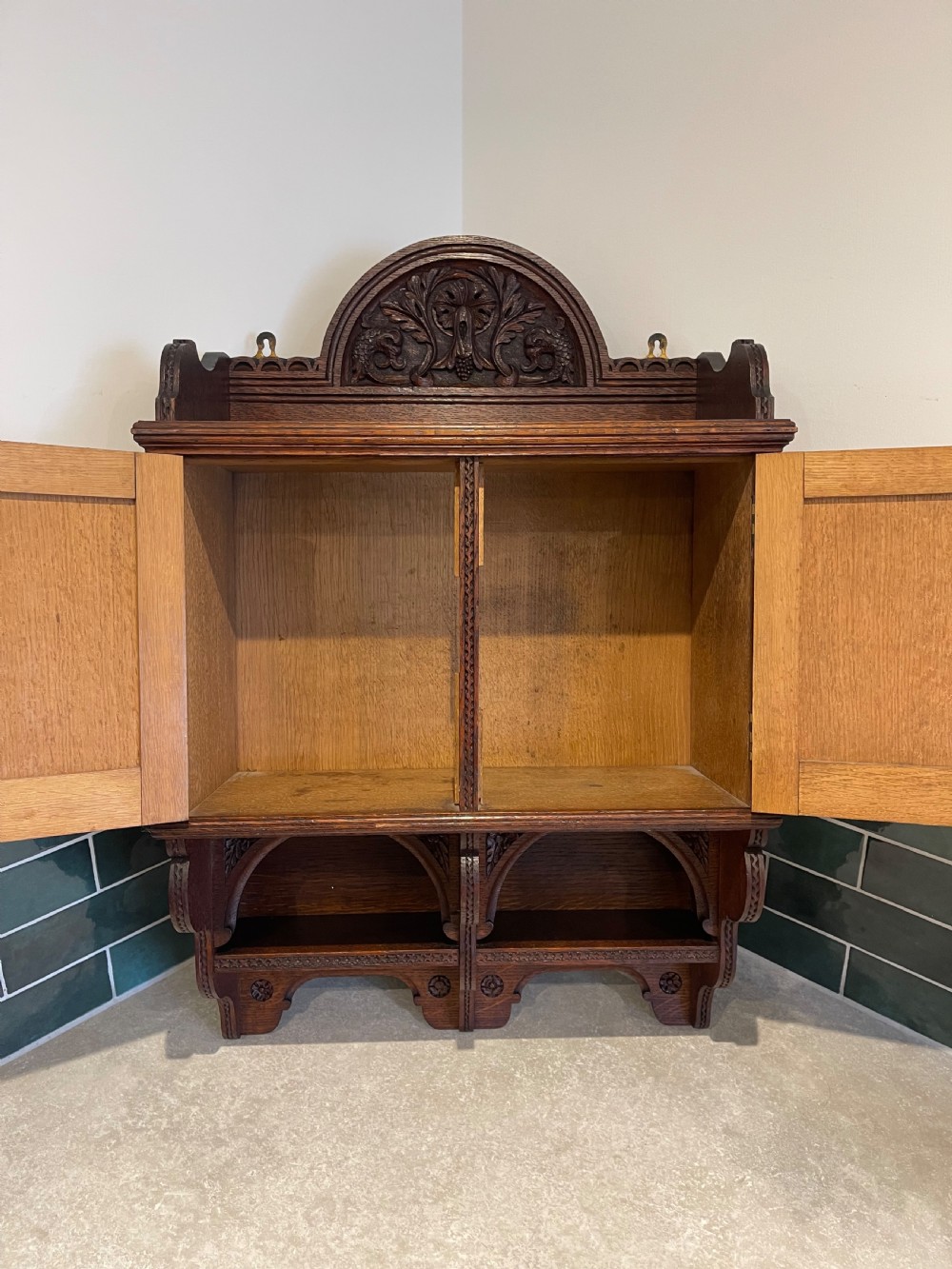 Carved oak wall cupboard  View V