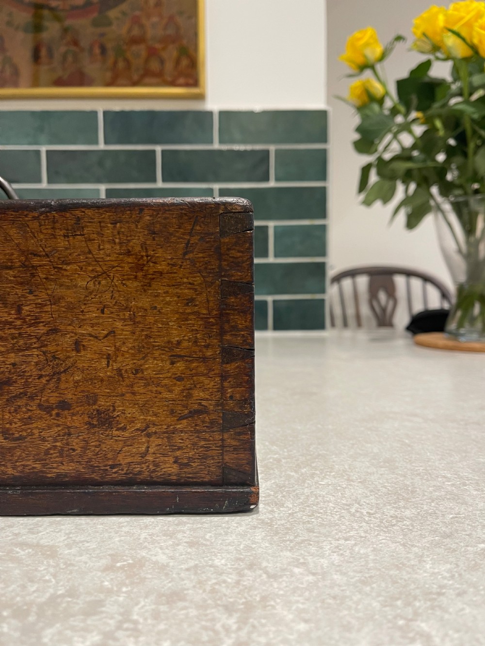 A rectangular dark mahogany wood cutlery box featuring two open compartments, visible corner dovetail joints, and a central metal carrying handle. View II