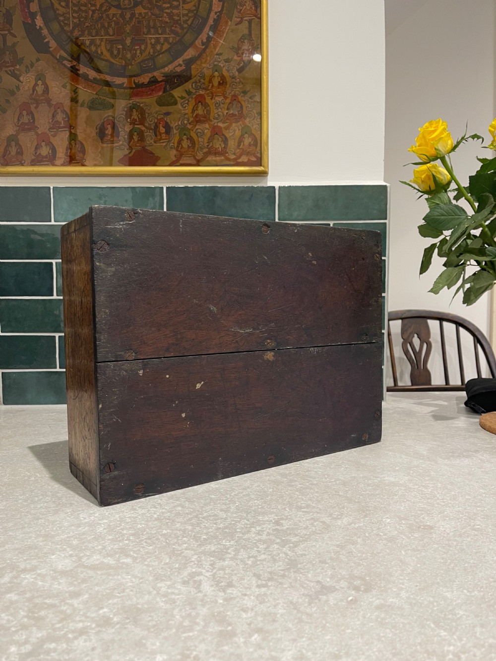 A rectangular dark mahogany wood cutlery box featuring two open compartments, visible corner dovetail joints, and a central metal carrying handle. View IV