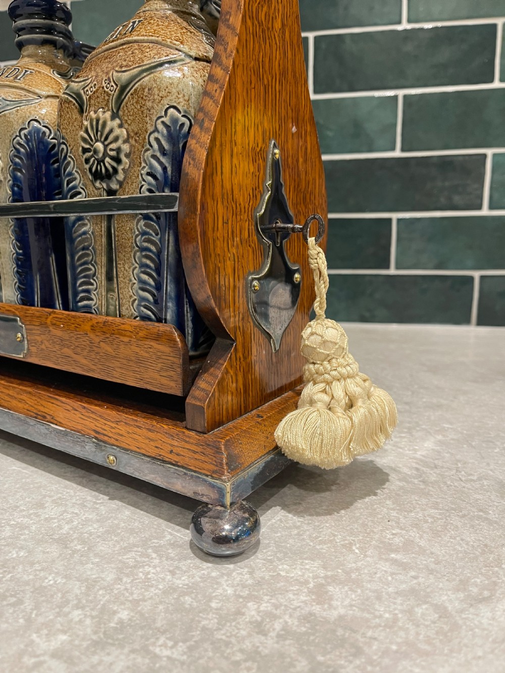 Nineteenth Century oak tantalus with stoneware flagons View IX