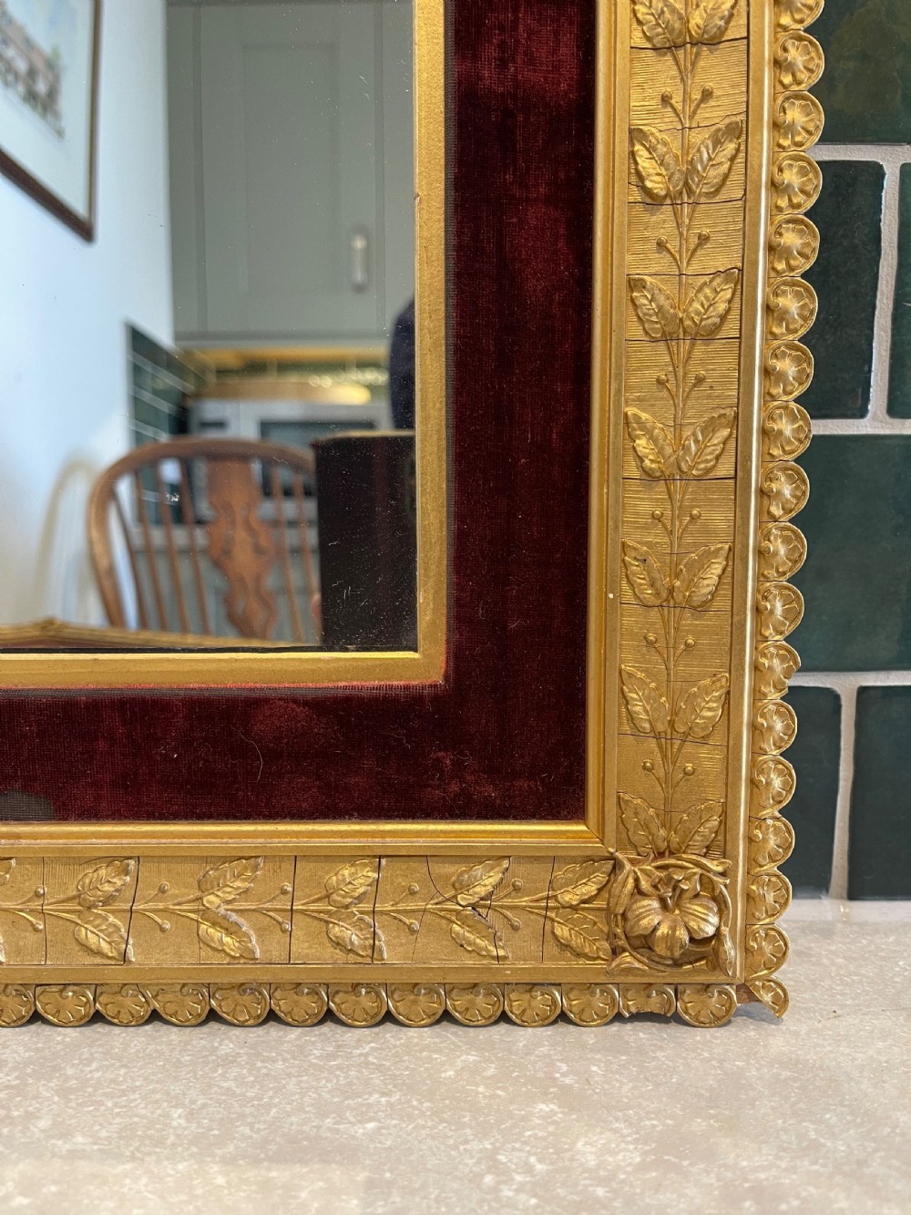 A pair of nineteenth-century rectangular mirrors featuring gold gilt frames decorated with leaf mouldings and lined with inner borders of crimson red velvet. View III