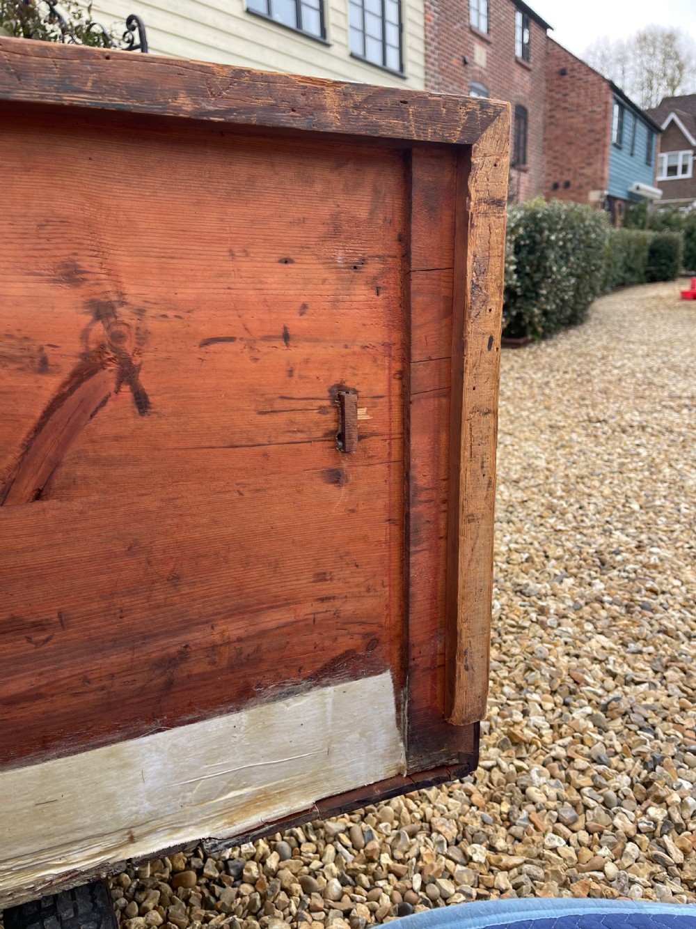 A tall Georgian mahogany secretaire press cupboard featuring two panelled doors above drawers with brass handles, resting on bracket feet. View XIII