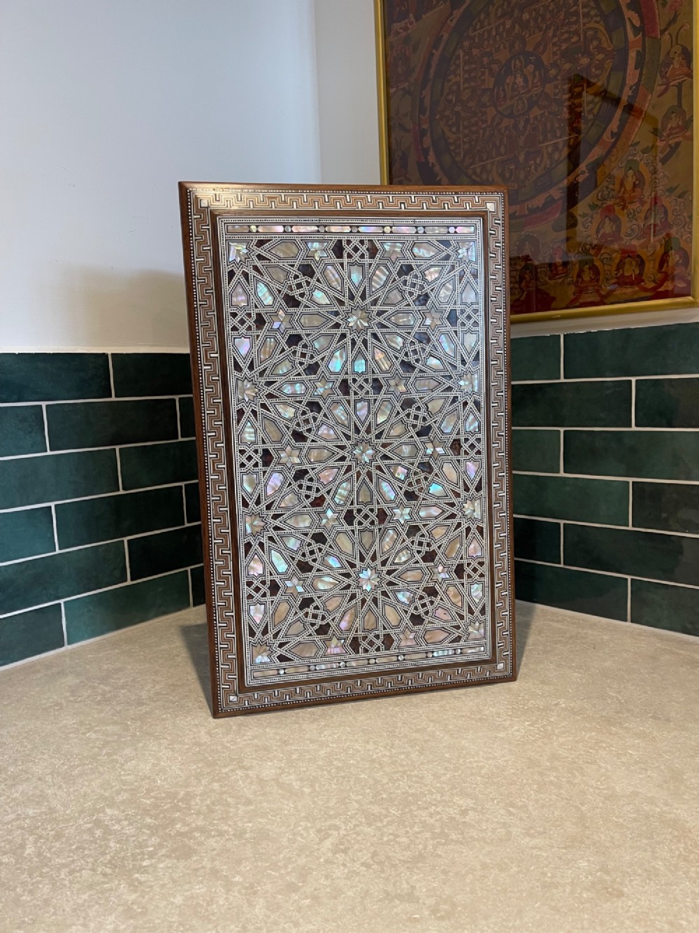 An Ottoman wooden tabletop cabinet featuring geometric mother-of-pearl and bone inlay, with a open side door revealing internal drawers. View VIII