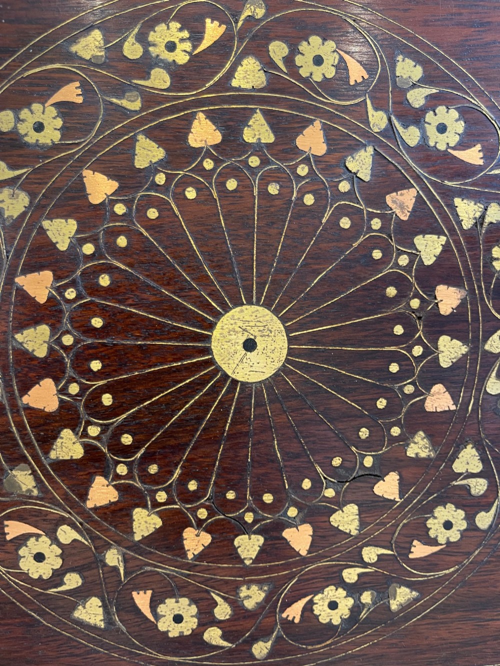 A rectangular dark hardwood serving tray featuring intricate floral and geometric brass inlay with cut-out side handles. View II