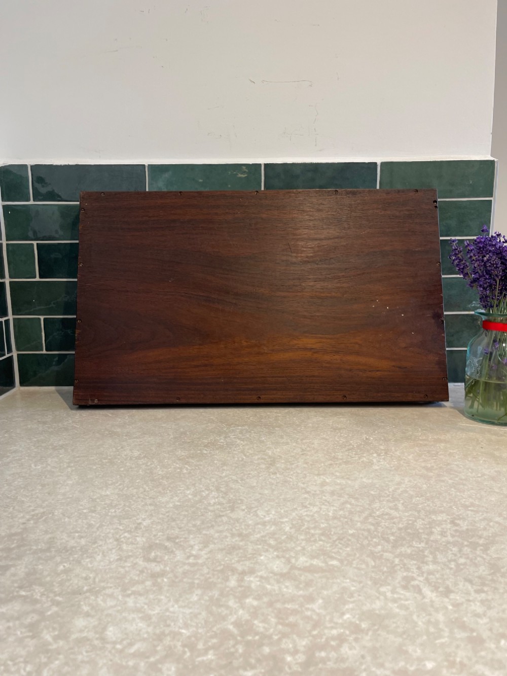 A rectangular dark hardwood serving tray featuring intricate floral and geometric brass inlay with cut-out side handles. View IV