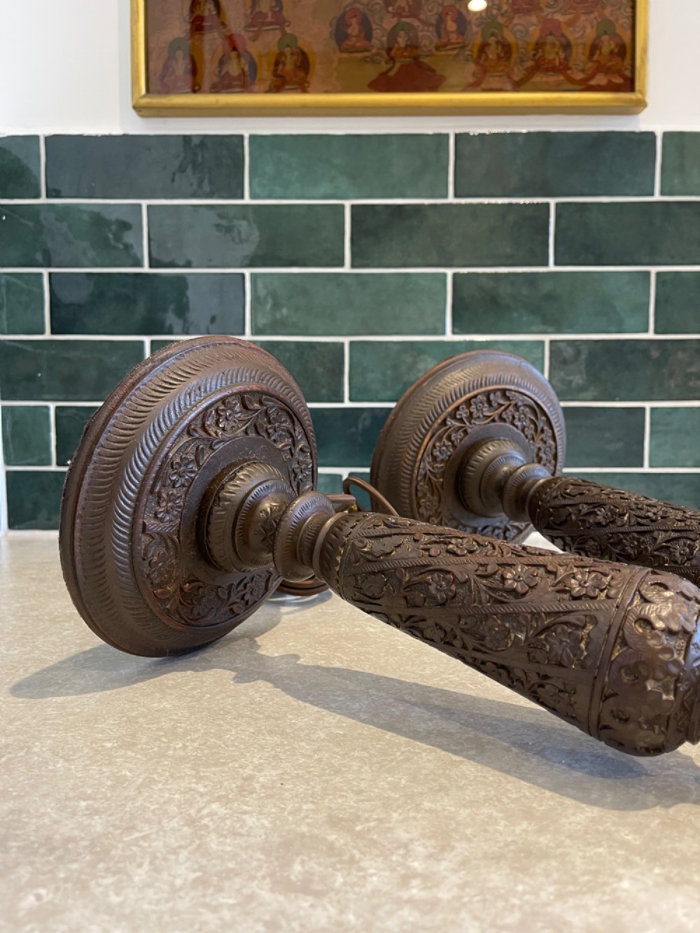 A pair of hand-carved dark brown walnut table lamp bases featuring turned baluster columns and detailed floral relief carving. View III
