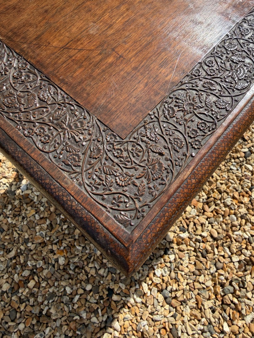 A rectangular hand-carved walnut table featuring slender cabriole legs, a scalloped apron, and relief carving along the top edge. View II