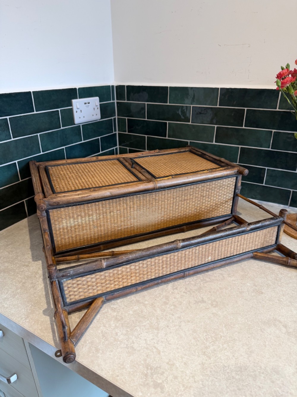 A Victorian bamboo and woven cane wall cupboard featuring two lower cabinet doors, an open upper display shelf, and an X-shaped cross support. View III