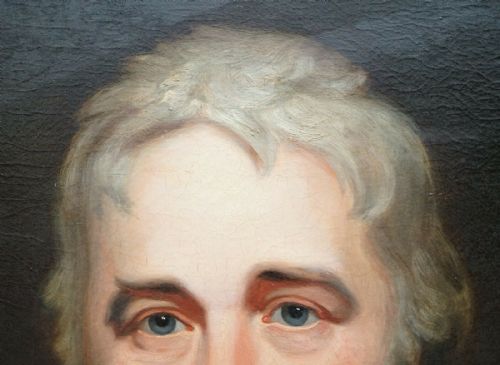 fig 9. A Regency period oil painting on canvas depicting a seated gentleman in a dark double-breasted coat, housed within a gilded wood frame.