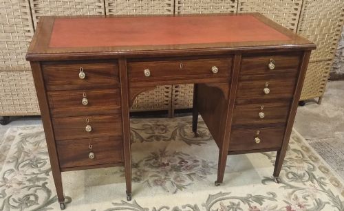 Edwardian Mahogany Inlaid Nine Drawer Desk.