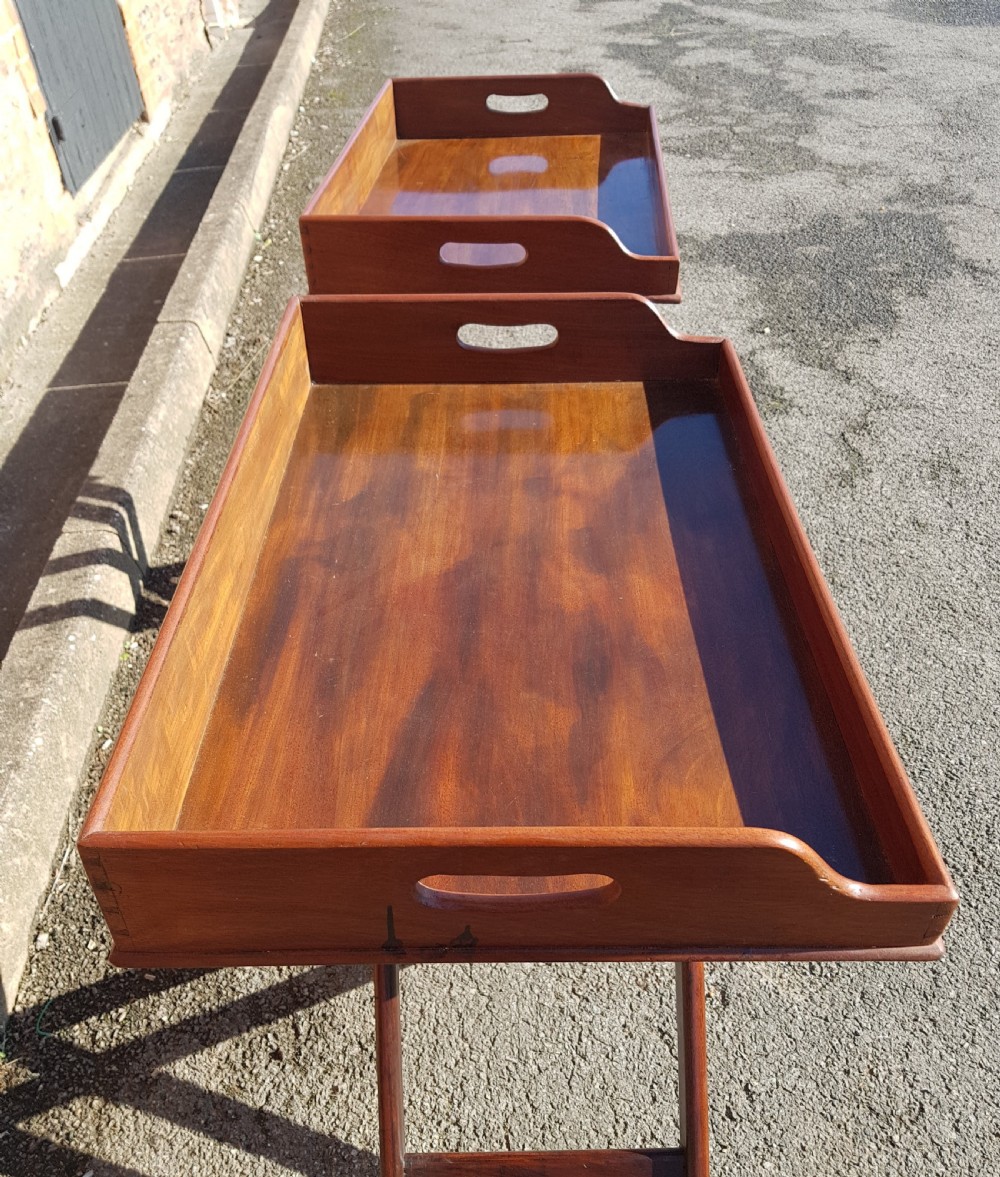 Pair of Victorian mahogany butler trays on stands. 
 View II