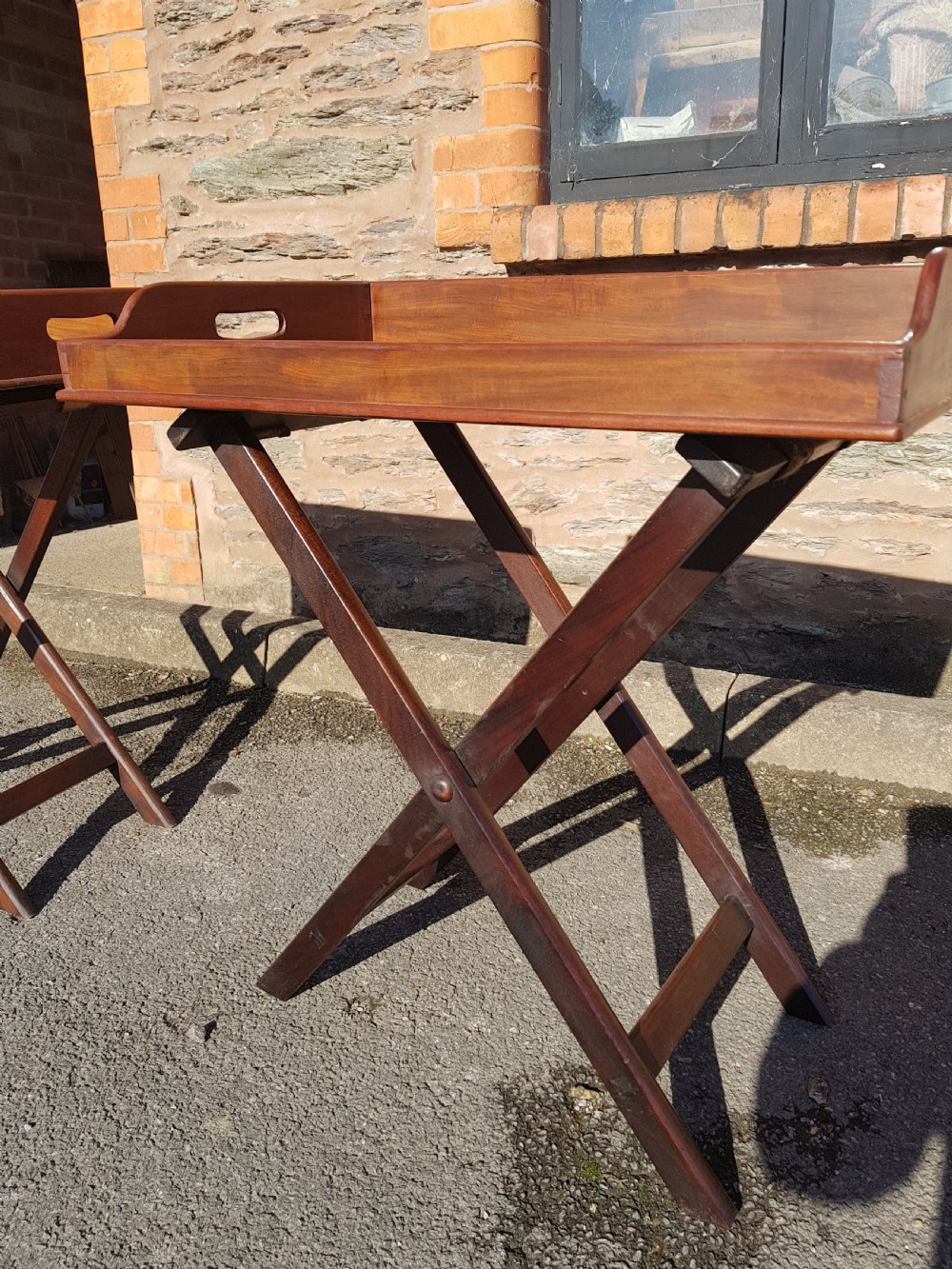 Pair of Victorian mahogany butler trays on stands. 
 View V