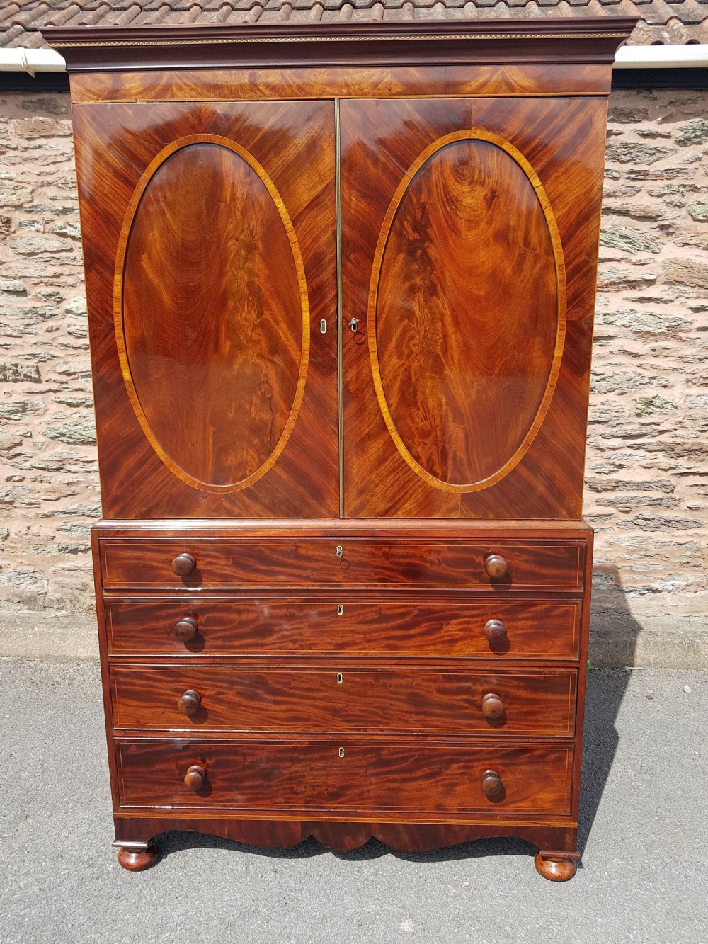 Regency mahogany inlaid channel island linen press 