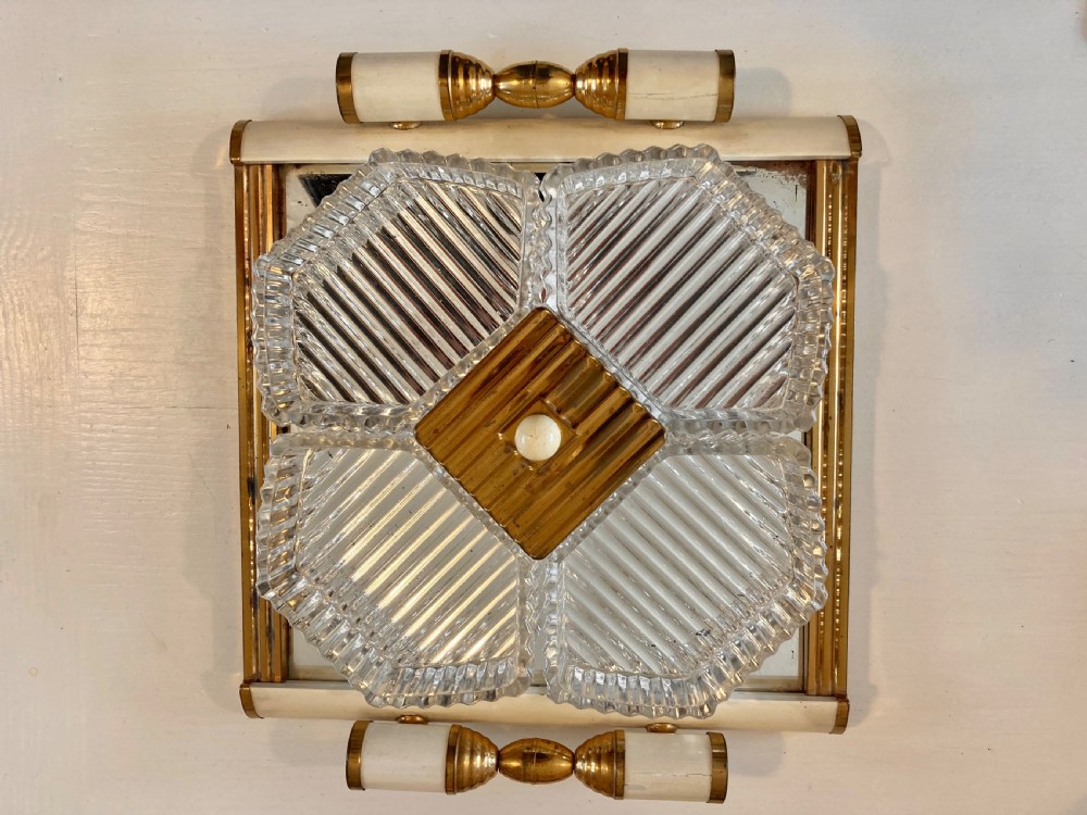 An early nineteenth-century Regency mahogany serving tray table featuring fitted cut-glass dishes and brass and bone handles on swept legs. View II