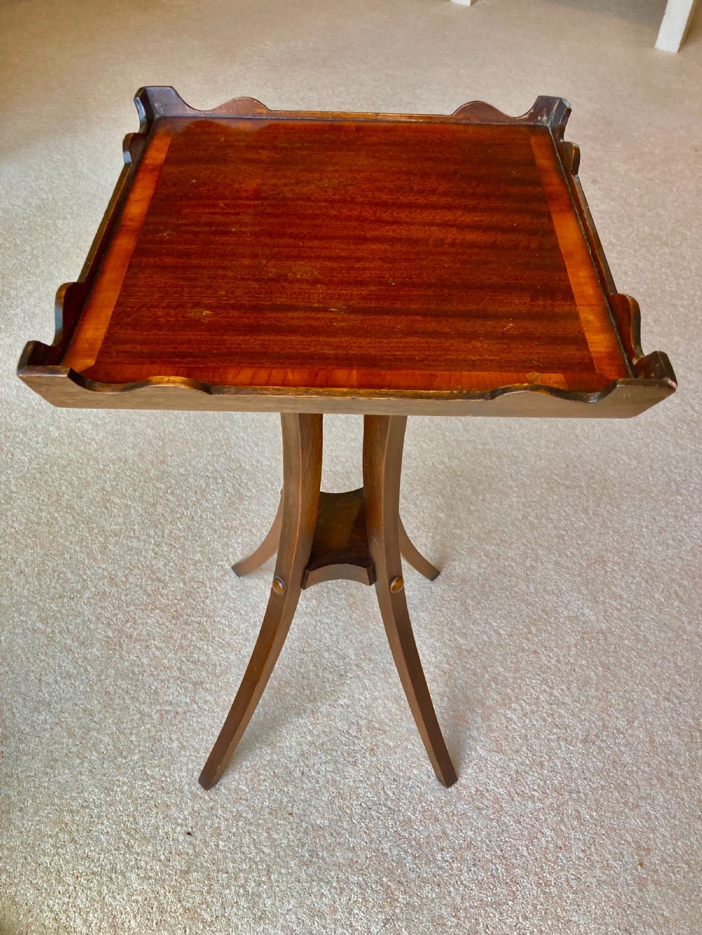 An early nineteenth-century Regency mahogany serving tray table featuring fitted cut-glass dishes and brass and bone handles on swept legs. View III