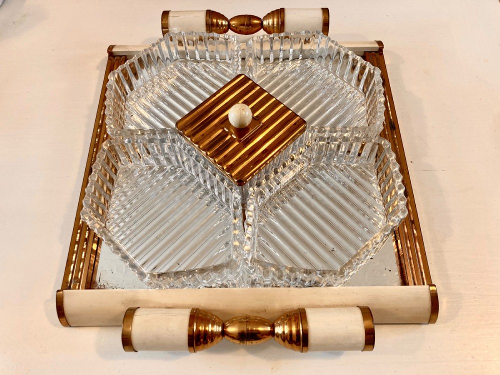 An early nineteenth-century Regency mahogany serving tray table featuring fitted cut-glass dishes and brass and bone handles on swept legs. View VI