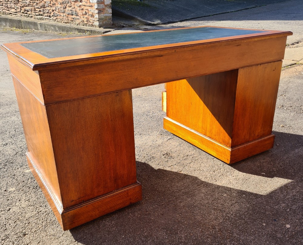 ANTIQUE VICTORIAN OAK NINE DRAWER DESK.  View V
