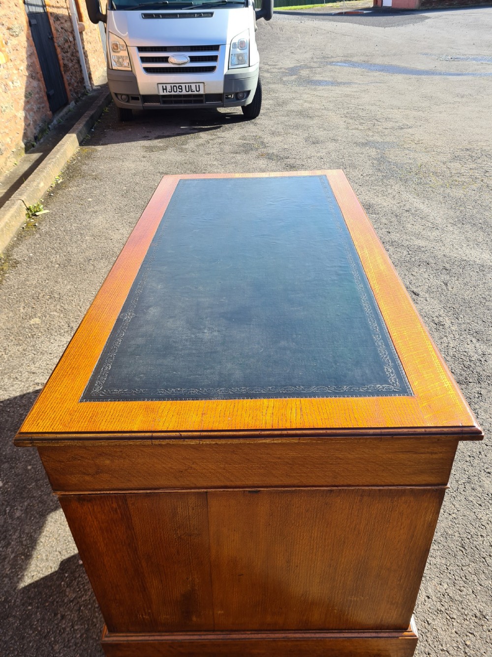 ANTIQUE VICTORIAN OAK NINE DRAWER DESK.  View VI