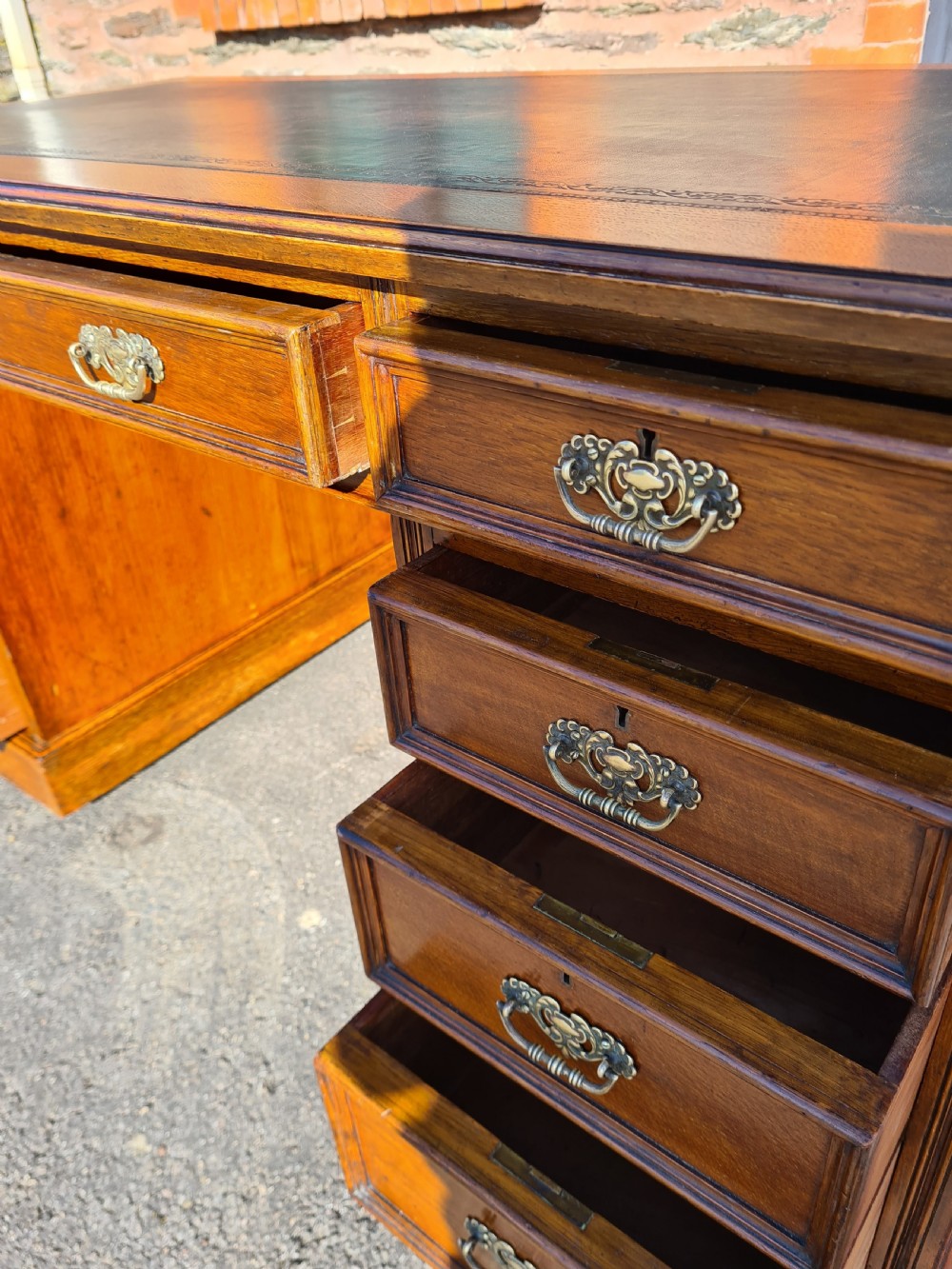 ANTIQUE VICTORIAN OAK NINE DRAWER DESK.  View VII