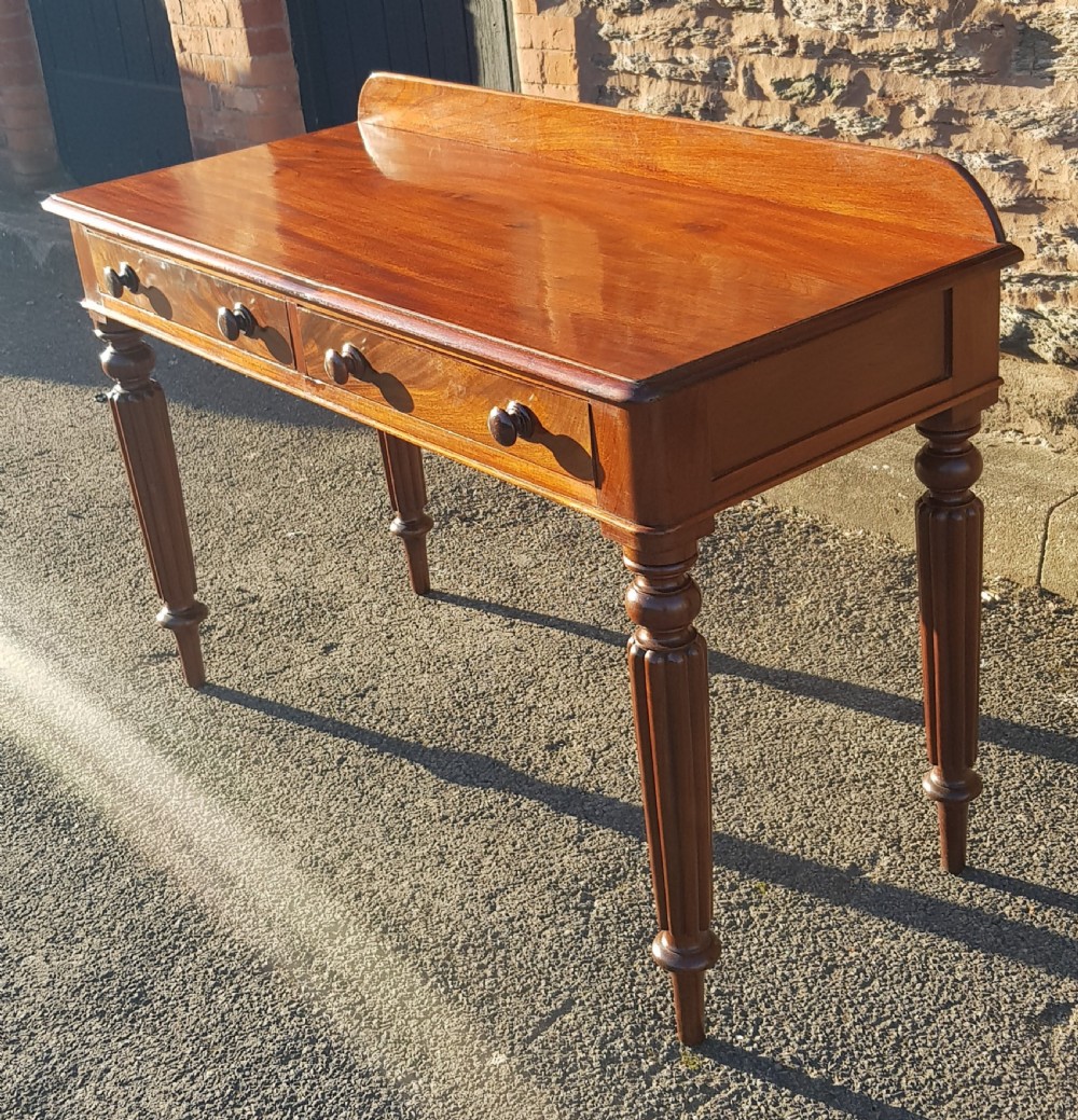 Victorian mahogany two drawer writing table.  View IV