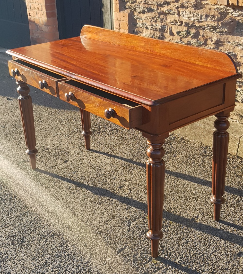 Victorian mahogany two drawer writing table.  View V