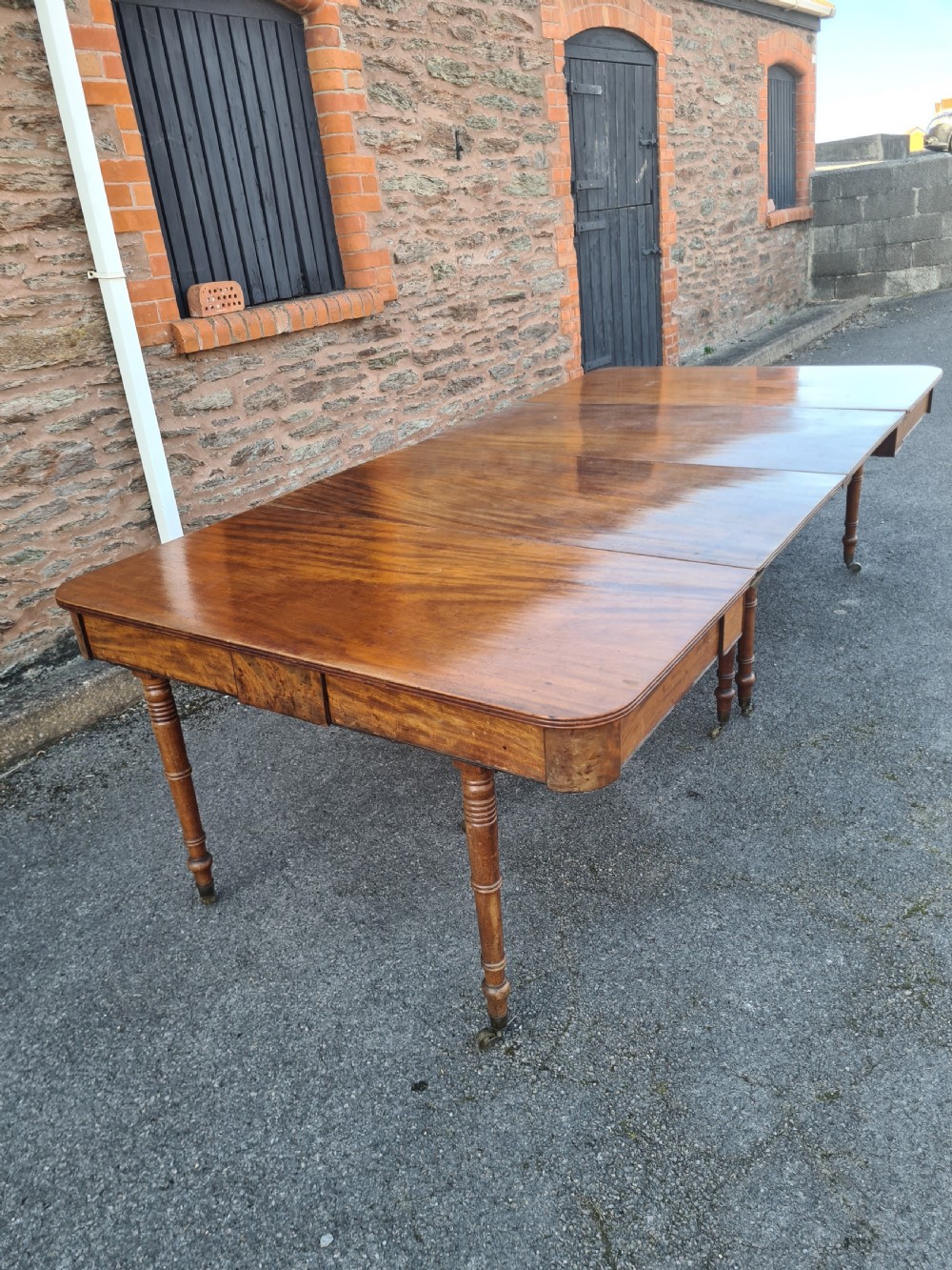 Georgian Mahogany ten leg two leaf Dinning Table  View II