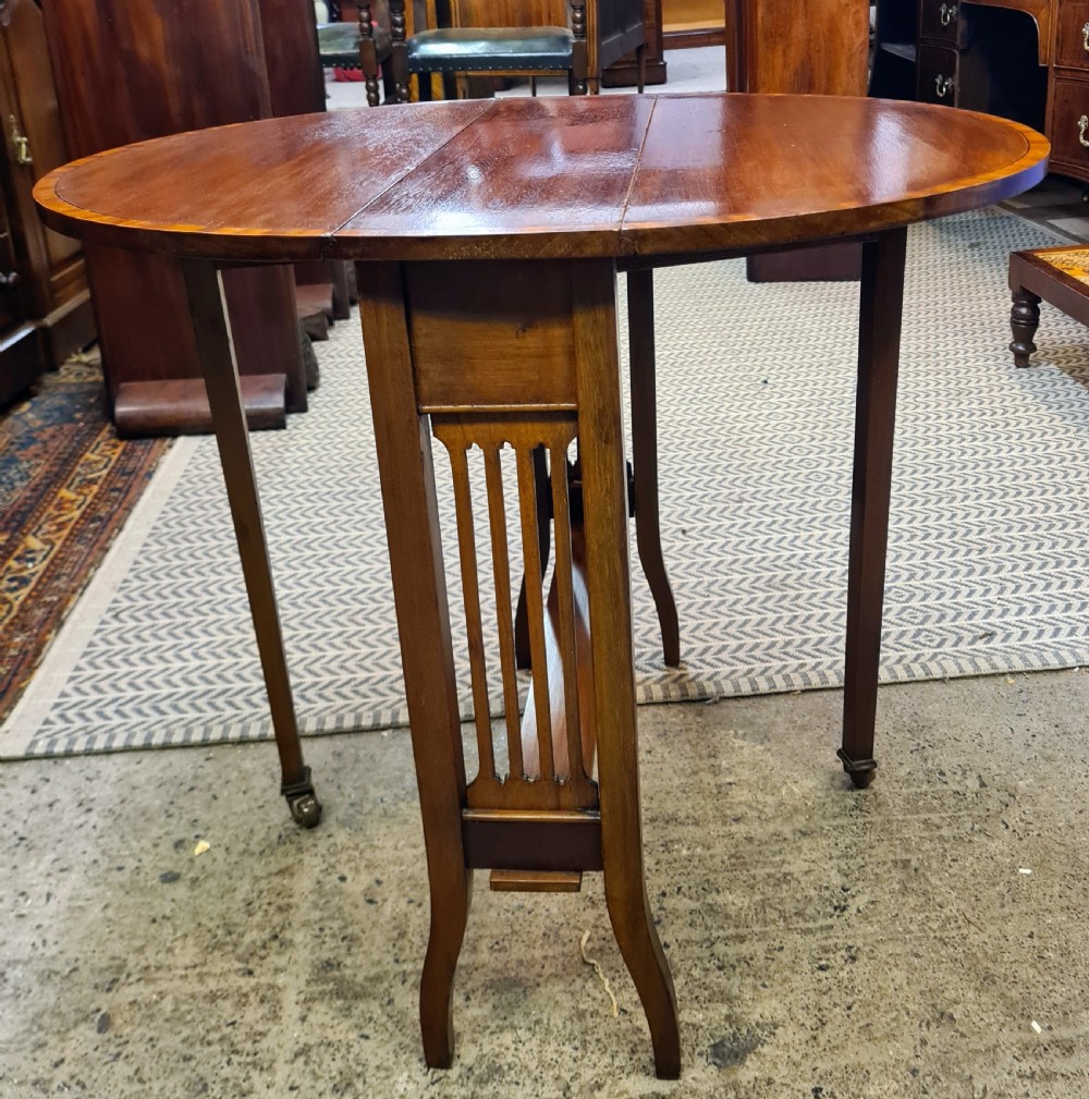 Edwardian Mahogany Inlaid Oval Sutherland Table. 