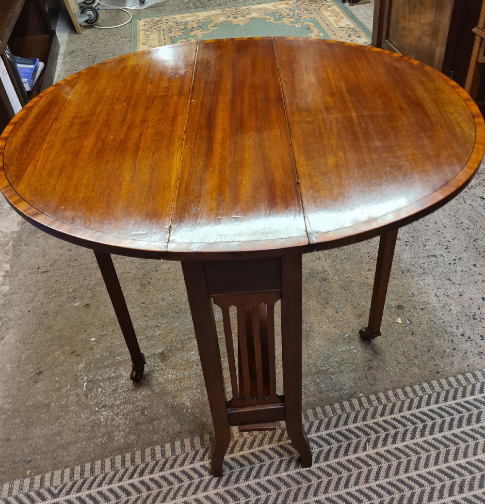 Edwardian Mahogany Inlaid Oval Sutherland Table.  View II