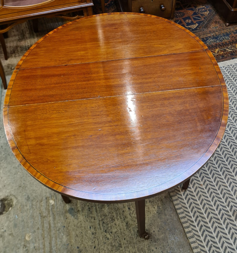 Edwardian Mahogany Inlaid Oval Sutherland Table.  View IV