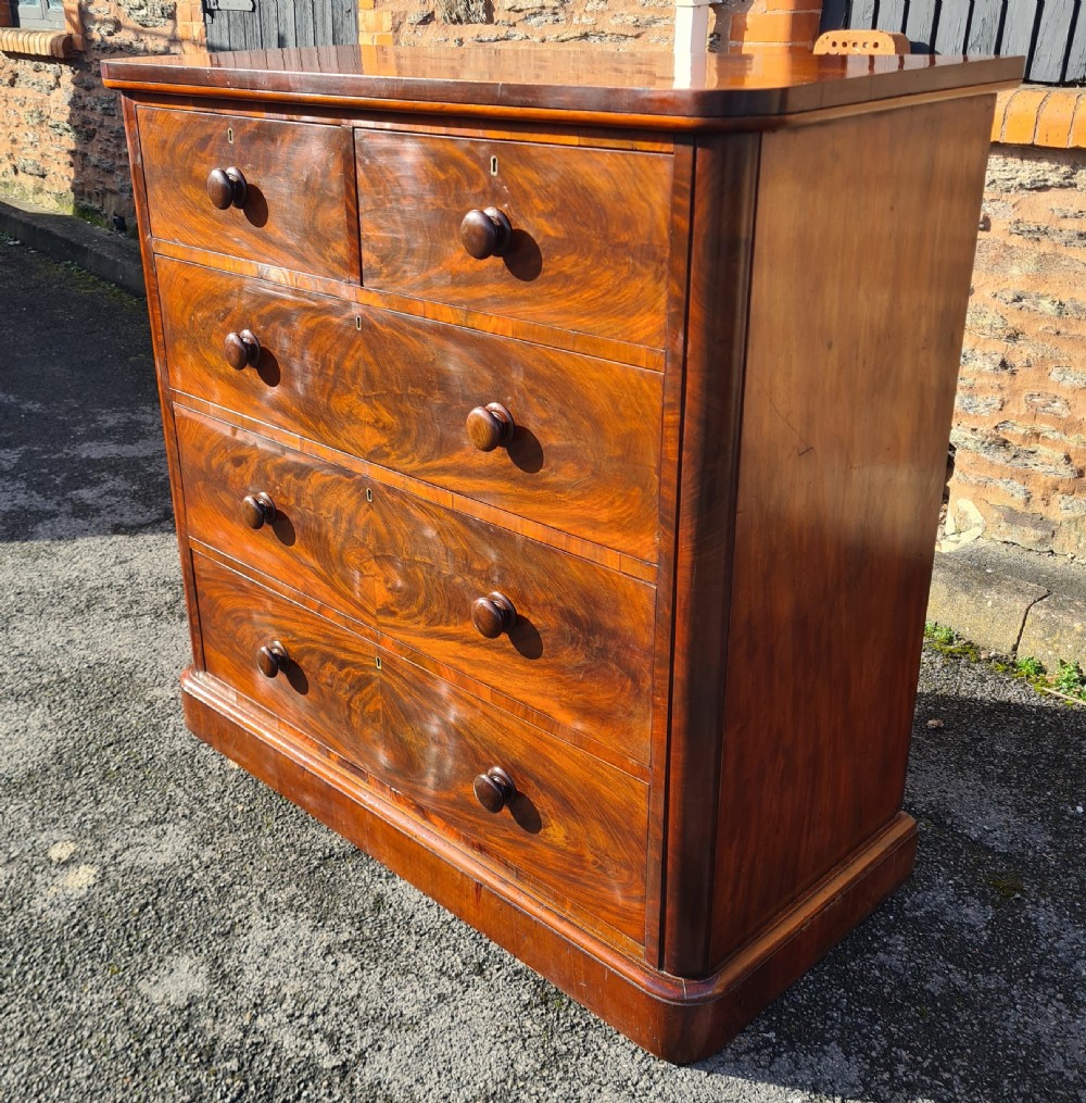 Victorian flame mahogany chest of drawers 