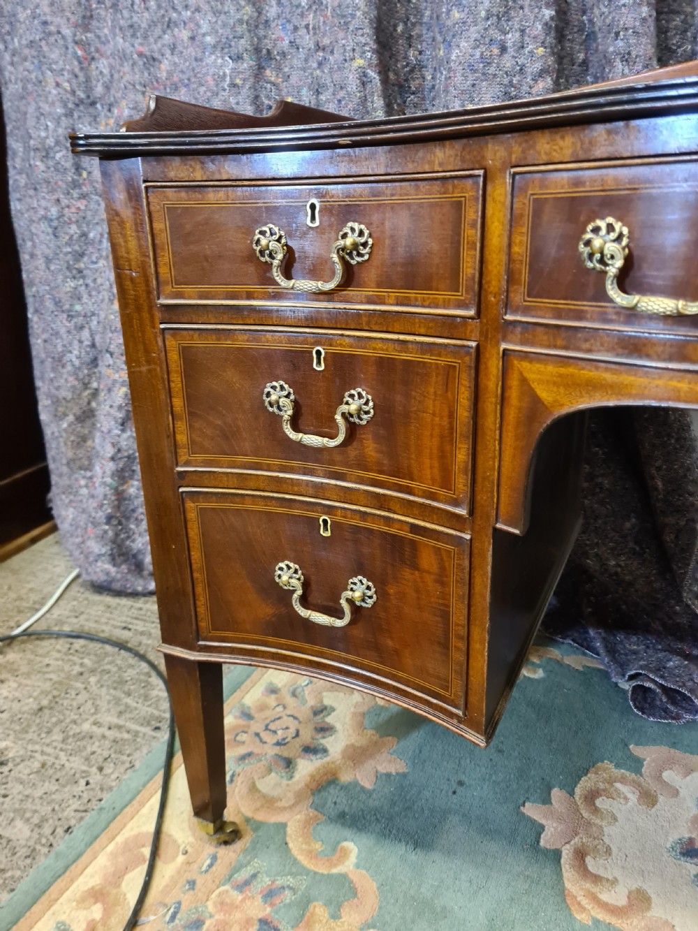 Edwardian Mahogany Serpentine Inlaid Desk.  View II