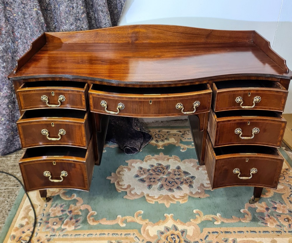 Edwardian Mahogany Serpentine Inlaid Desk.  View VI