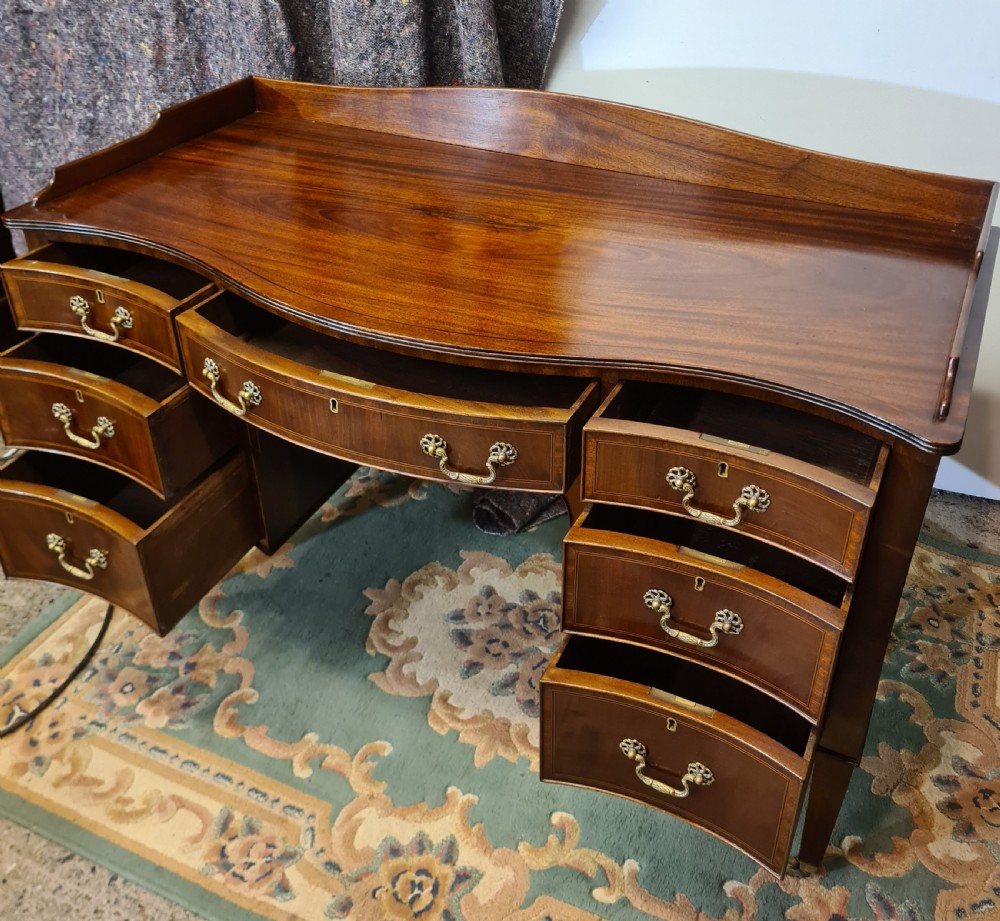 Edwardian Mahogany Serpentine Inlaid Desk.  View VII