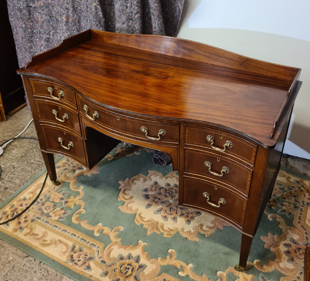 Edwardian Mahogany Serpentine Inlaid Desk.  View VIII