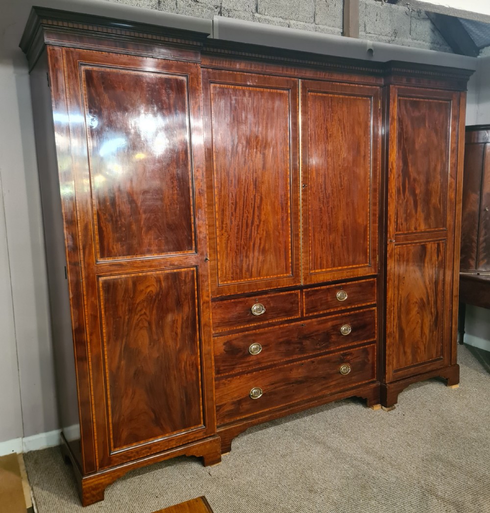 19th Century Georgian mahogany inlaid four door Wardrobe .