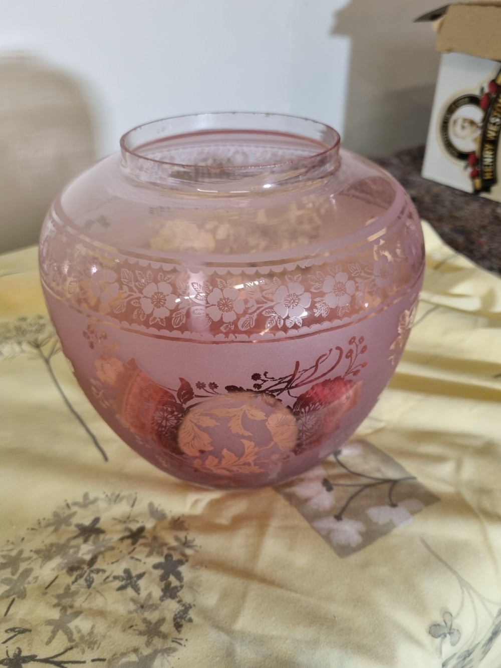 A Victorian oil lamp featuring an etched pink glass shade, clear glass reservoir, brass duplex burner, and black plinth base. View II