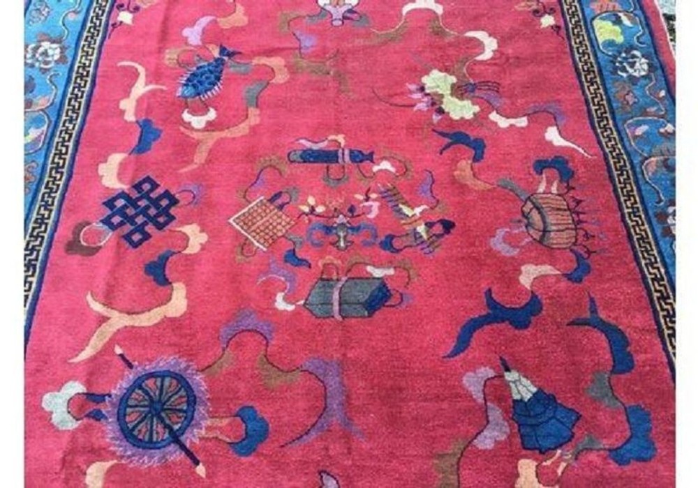 A hand-knotted Chinese Art Deco wool rug featuring a bright pink central field with traditional floral motifs surrounded by a blue patterned border. View VI