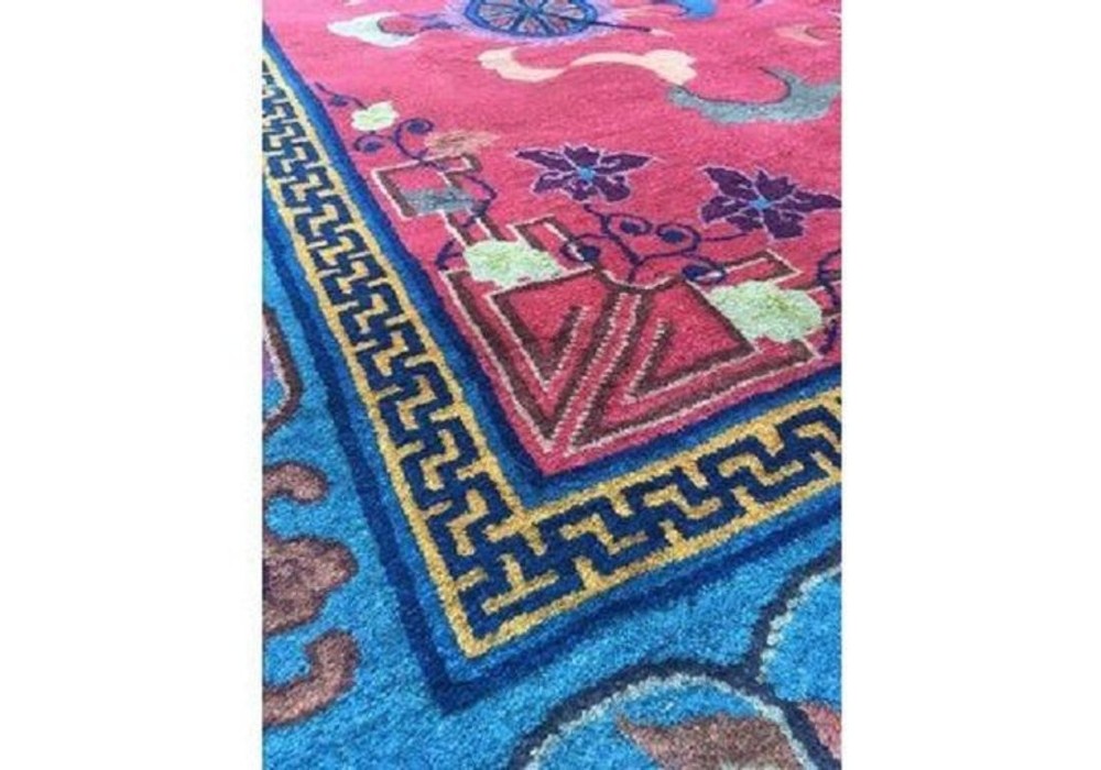 A hand-knotted Chinese Art Deco wool rug featuring a bright pink central field with traditional floral motifs surrounded by a blue patterned border. View IX