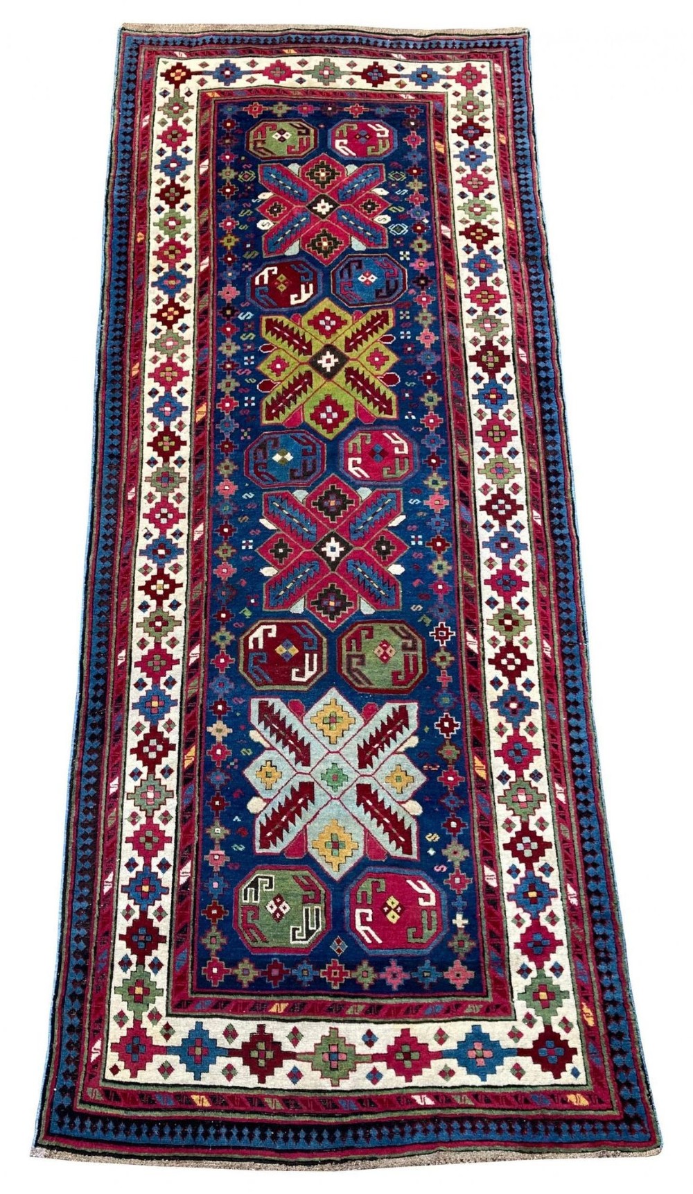 An elongated Caucasian Talish runner rug featuring geometric star motifs and octagons set against a deep indigo field with patterned borders. View II