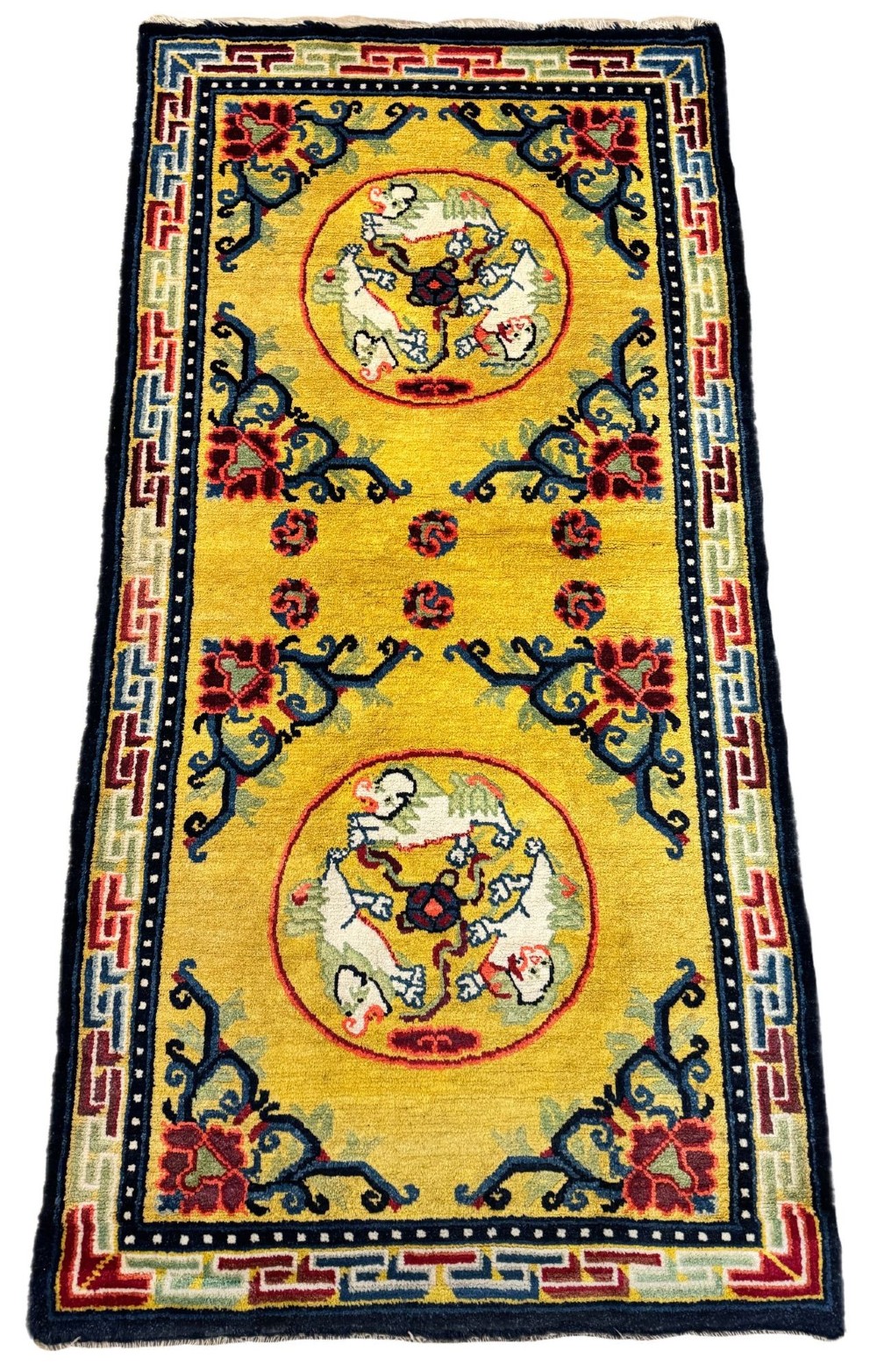 An antique hand-knotted Chinese Ningxia rectangular wool rug featuring a bright yellow field with two circular animal medallions, floral corner accents, and a blue geometric fretwork border. View II