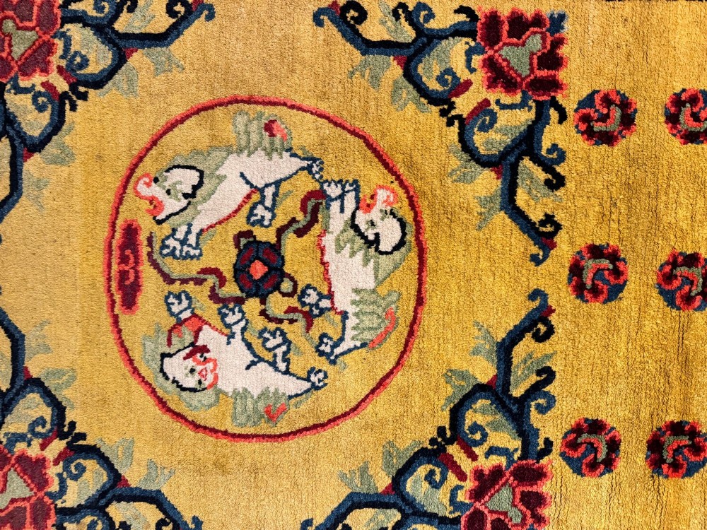 An antique hand-knotted Chinese Ningxia rectangular wool rug featuring a bright yellow field with two circular animal medallions, floral corner accents, and a blue geometric fretwork border. View XII