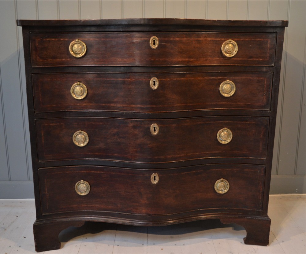 Serpentine mahogany chest of drawers View II
