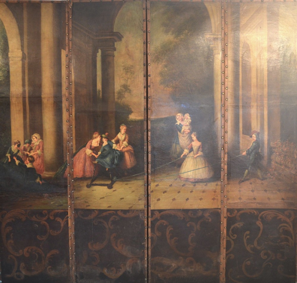 A four-panel antique folding room screen featuring painted classical architectural columns, figures in period dress, and scrolling acanthus base motifs with studded brass edging.