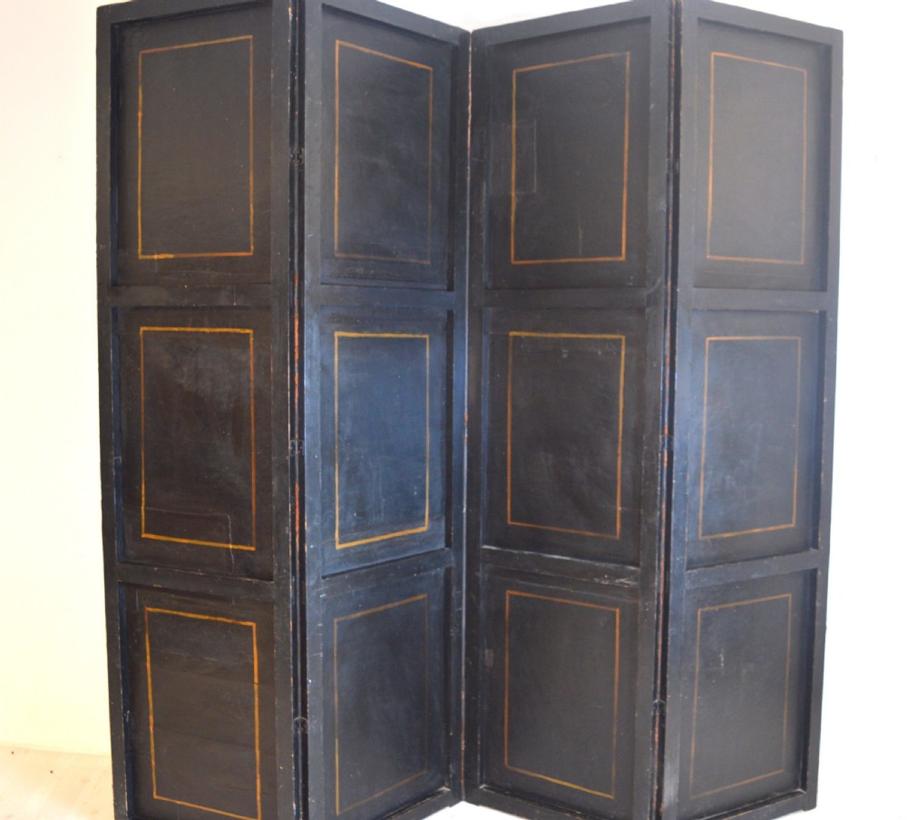 A four-panel antique folding room screen featuring painted classical architectural columns, figures in period dress, and scrolling acanthus base motifs with studded brass edging. View IX