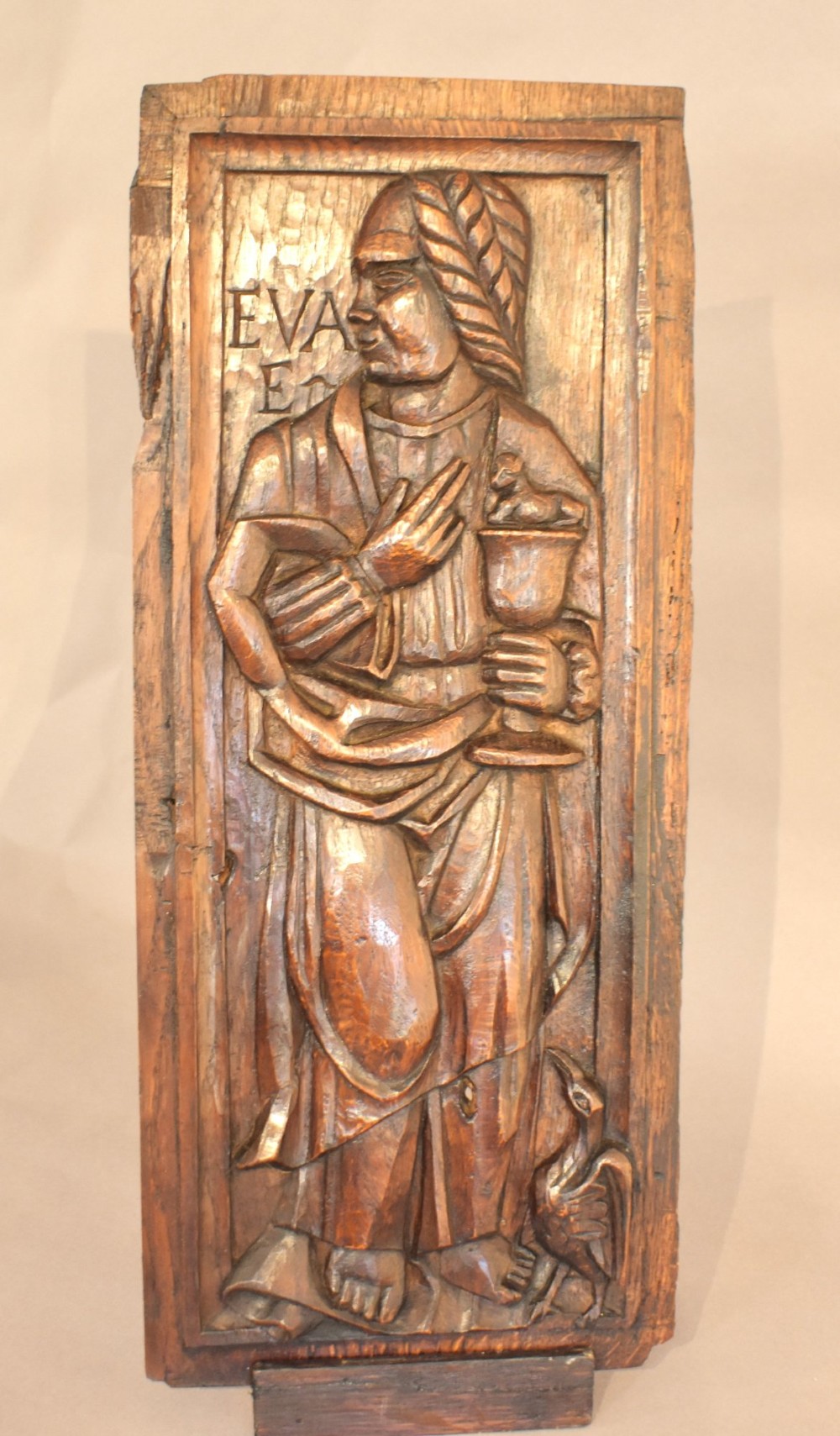 A pair of 17th-century rectangular dark oak timber panels featuring hand-carved relief figures of saints with Latin inscriptions. View VI
